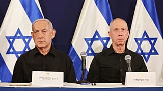 Israeli Prime Minister Benjamin Netanyahu, left and Defense Minister Yoav Gallant attend a press conference in the Kirya military base in Tel Aviv, Israel, Oct. 28, 2023.