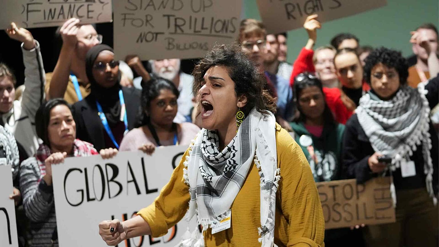 Activists participate in a demonstration for climate finance at the COP29 UN Climate Summit, Saturday, Nov. 23, 2024, in Baku, Azerbaijan.