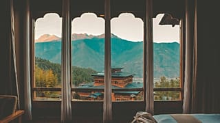 Ein Aufenthalt in Bhutan kann Sie lehren, langsamer zu werden, sich mit der Natur zu verbinden und sich vom buddhistischen Mitgefühl inspirieren zu lassen. 