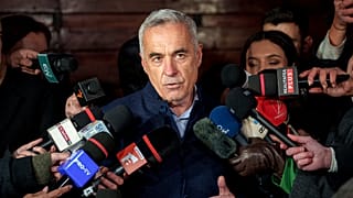 Calin Georgescu speaks to media, in Izvorani, Romania, Tuesday, Nov. 26, 2024.