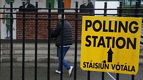 People arrive to cast their votes at the polling station at St Laurence O'Tooles National School in Dublin, 29 November, 2024