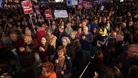 Demonstrators march during a protest a month after devastating floods to demand the resignation of the regional officials who bungled the emergency response in Valencia, Spain