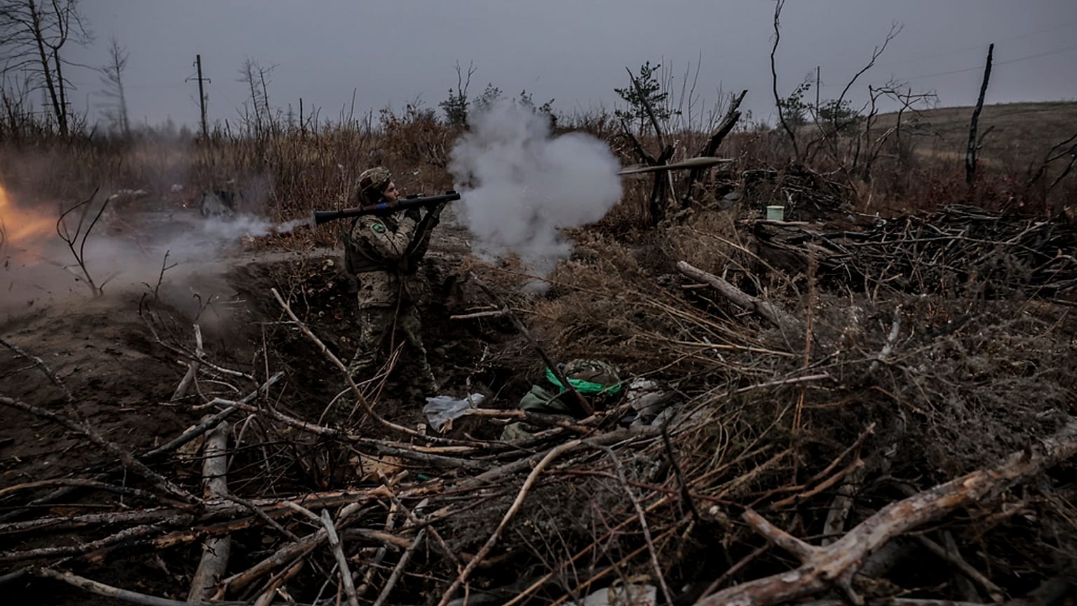 In this photo provided by Ukraine's 24th Mechanised Brigade press service, a serviceman of the 24th Mechanised Brigade improves his tactical skills at the training field in Do