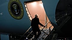 President Joe Biden boards Air Force One on Sunday en route to Angola as he makes his long-promised visit to Africa