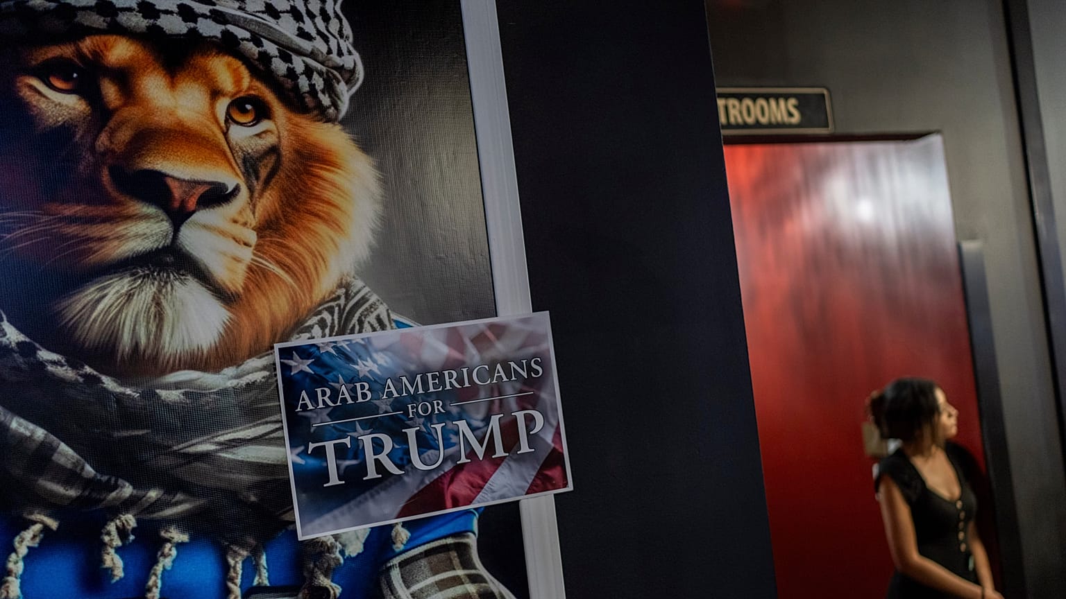 A sign is displayed during an Arab Americans for Trump election watch party at Lava Java Cafe, a hookah lounge, in the early hours of 6 November 2024, in Dearborn, Michigan