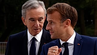 LVMH luxury group CEO Bernard Arnault, left, and French President Emmanuel Macron in 2021