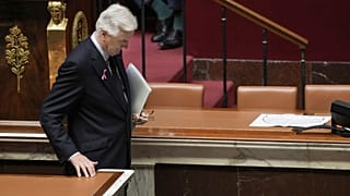 The French Prime Minister, Michel Barnier, leaves the rostrum of the Assembly