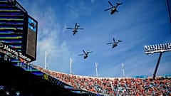 US Marine Light Attack Helicopter Squadron 269 flies over Bank of America Stadium before an NFL football game 