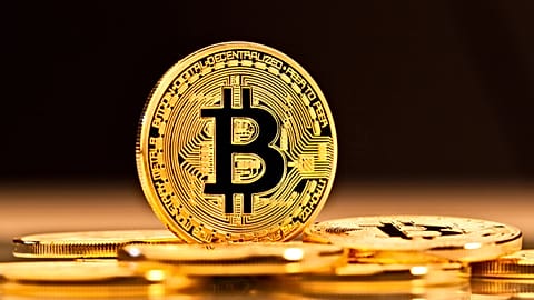 The Bitcoin logo on a black background