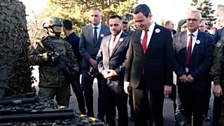 Kosovo PM Albin Kurti (R) and Minister of Defence Ejup Maqedonci (L) marking Kosovo Security Forces day on November 27,