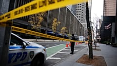 The scene on 54th Street outside the Hilton Hotel in midtown Manhattan where Brian Thompson, the CEO of UnitedHealthcare, was killed. Wednesday Dec. 4, 2024, in New York.