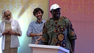 Senegalese director Moly Kane receiving an award for his film ‘Ici Repose’ as part of the Atlas Workshops in Marrakech, Morocco. 