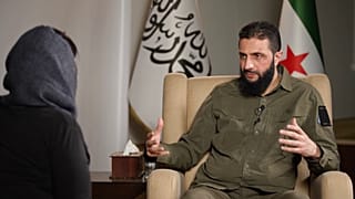 HTŞ lideri Colani (sağda) ve gazeteci Jomana Karadsheh CNN yayınında görüntüleniyor (Ekran görüntüsü: CNN)