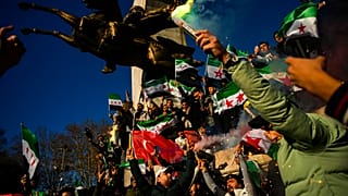 People gather to celebrate the Syrian government fall in Istanbul, Turkey, Sunday, Dec. 8, 2024.