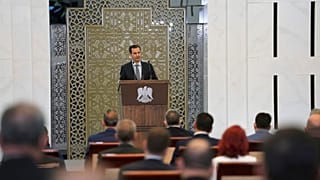 Der syrische Präsident Bashar al-Assad spricht vor dem Parlament in Damaskus, Syrien, Mittwoch, 12. August 2020.