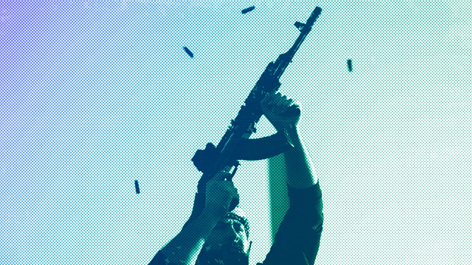 An opposition fighter fires his AK-47 in the air in celebration after opposition forces took control of the city in Damascus, 8 December 2024