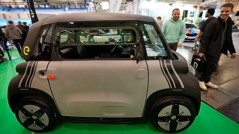A small cheap electric Opel Rocks-e car under €10,000 by the Stellantis Group is on display at the Essen Motor Show in Essen, Germany