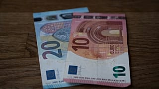 Two euro notes on a table