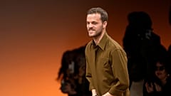Matthieu Blazy accepts applause after the conclusion of the Bottega Veneta women's Fall-Winter 2024-25 collection presented in Milan, Italy, Feb. 24, 2024.