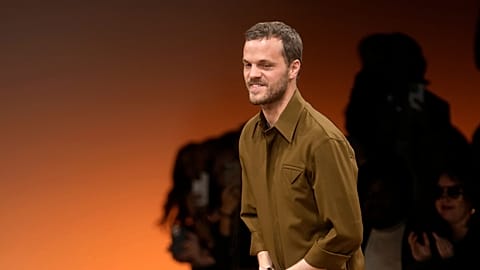 Matthieu Blazy accepts applause after the conclusion of the Bottega Veneta women's Fall-Winter 2024-25 collection presented in Milan, Italy, Feb. 24, 2024.