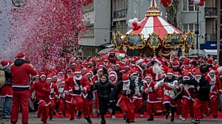 Thousands of Kosovars donned their festive attire for the annual Christmas theme charity run of Santas flooding the streets of Kosovo's capital  on Sunday, Dec 15, 2024.