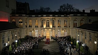 France's newly appointed Prime Minister Francois Bayrou and outgoing Prime minister Michel Barnier speak at Matignon, Paris. 13 December, 2024.