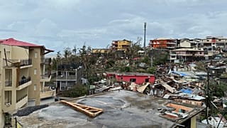 Damaged houses are seen in Mamoudzou, in the French Indian Ocean territory of Mayotte.