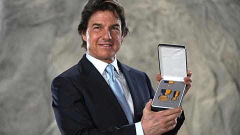 Tom Cruise gets a top US Navy honour for boosting the military with screen roles 