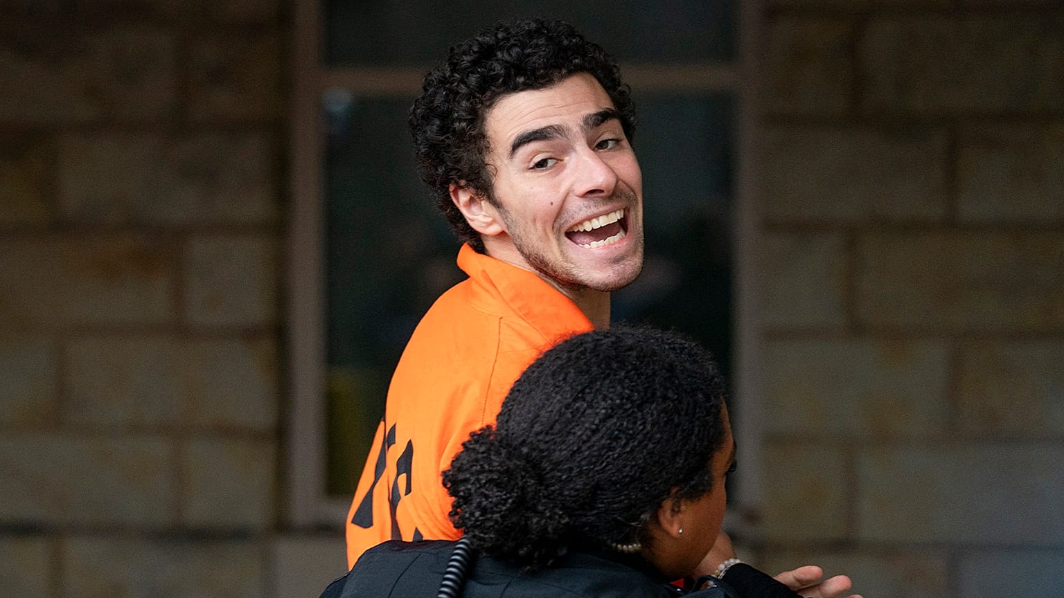 Suspect Luigi Mangione is taken into the Blair County Courthouse on Tuesday, 10 December 2024, in Hollidaysburg, PA
