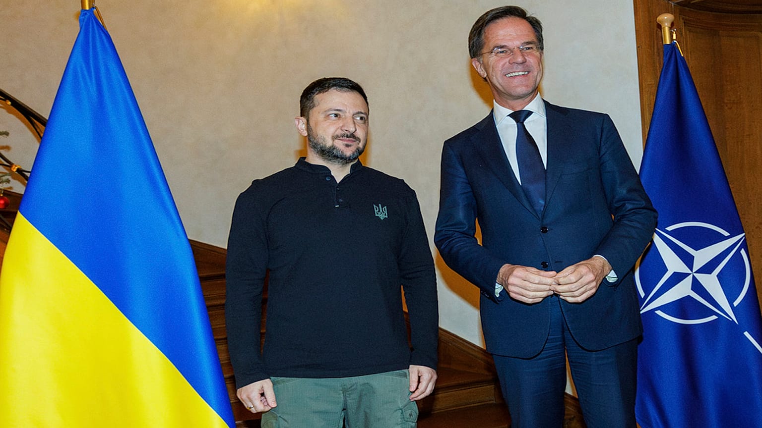 NATO Secretary General Mark Rutte, right, greets Ukraine's President Volodymyr Zelenskyy prior to a meeting in Brussels on Wednesday, Dec. 18, 2024.