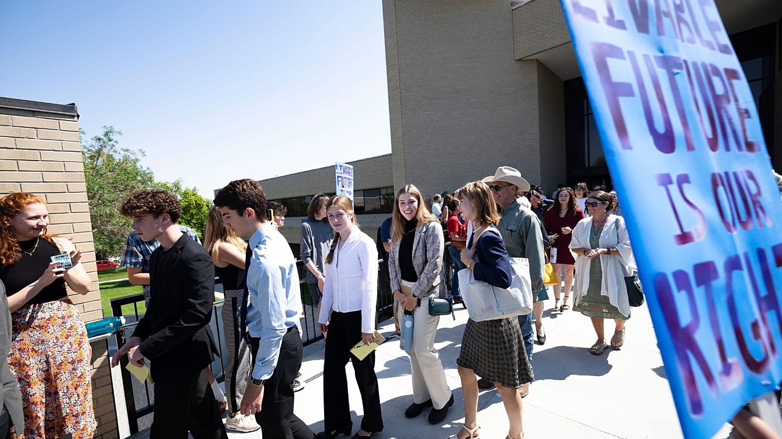 Youth plaintiffs in the Held v. Montana climate case leave the Montana Supreme Court, 10 July 2024, in Helena, Montana. 