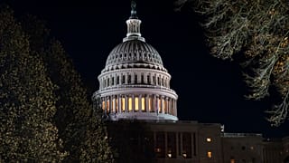 The Capitol Christmas tree is illuminated in Washington, after the Republican-controlled House of Representatives failed to pass an interim spending bill, Thursday, Dec. 19, 2
