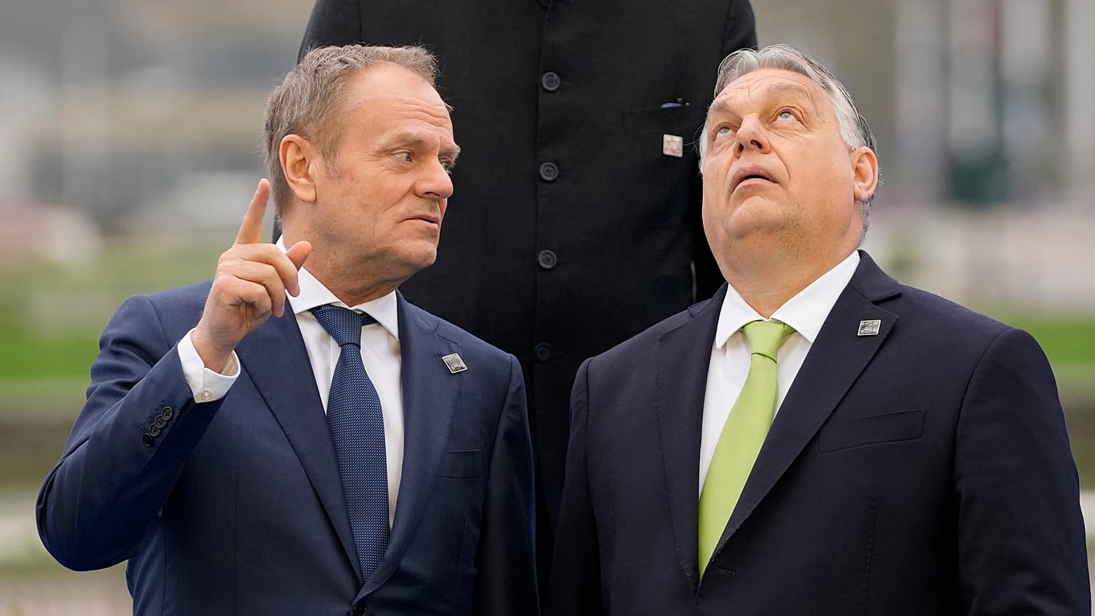 Hungary's Prime Minister Viktor Orban, right, speaks with Poland's Prime Minister Donald Tusk during a Nuclear Energy Summit in Brussels, 21 March, 2024