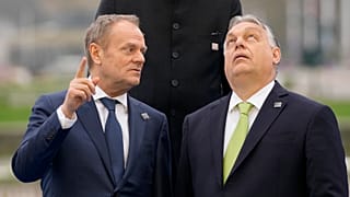 Hungary's Prime Minister Viktor Orban, right, speaks with Poland's Prime Minister Donald Tusk during a Nuclear Energy Summit in Brussels, 21 March, 2024