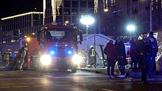 emergency services attend an incident at the Christmas market in Magdeburg, Germany