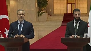 Hakan Fidan ve HTŞ lideri Ahmed Hüseyin eş-Şara.