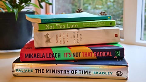 Well-loved copies of five incredible 'climate books'. 