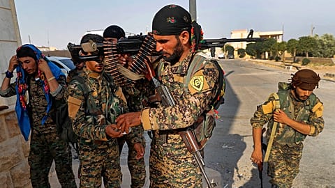 Combattenti a guida curda sostenuti dagli Stati Uniti si preparano alla battaglia contro i militanti del gruppo dello Stato islamico, Raqqa, 22 giugno 2017