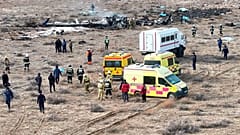 The wreckage of Azerbaijan Airlines Embraer 190 lays on the ground near the airport of Aktau, 25 December 2024