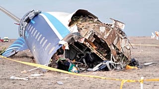The wreckage of Azerbaijan Airlines Embraer 190 lies on the ground near the airport of Aktau, 25 December 2024