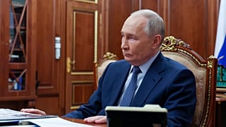 Russian President Vladimir Putin meets with Emergency Situations Minister Alexander Kurenkov at the Kremlin in Moscow, Russia, Friday, Dec. 27, 2024.