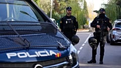 FILE- Police officers stand guard in Madrid, 30 November 2022