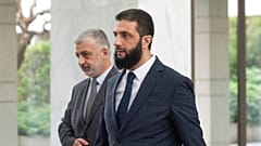 Syria's de facto leader Ahmad al-Sharaa, foreground, formerly known as Abu Mohammed al-Golani