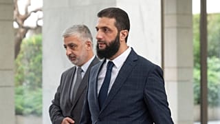 Syria's de facto leader Ahmad al-Sharaa, foreground, formerly known as Abu Mohammed al-Golani