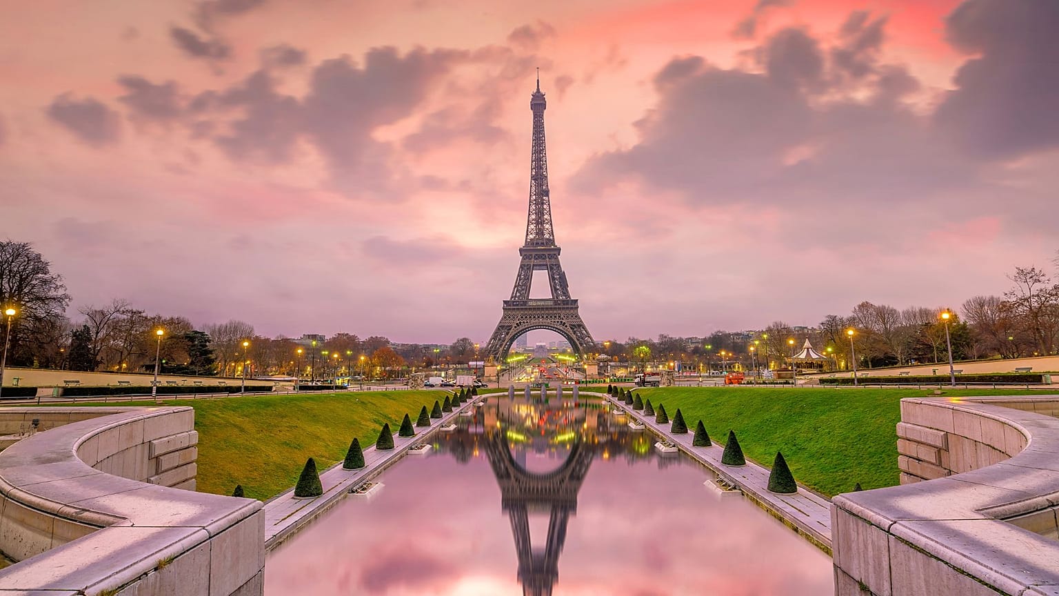 The Eiffel Tower at sunrise in Paris, France. 