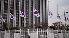 Flaggen auf halbmast: Südkorea trauert nach der schlimmsten Flugzeugkatastrophe, die das Land je erlebt hat.