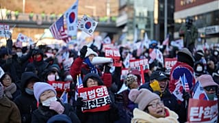 Supporters of impeached South Korean President Yoon Suk Yeol stage a rally in Seoul, South Korea, Friday, Jan. 3, 2025.