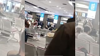 مواجهه یک خانم دارای حجاب اختیاری با یک آخوند در فرودگاه مهرآباد تهران