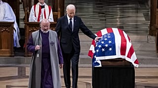 Joe Biden durante i funerali di Jimmy Carter