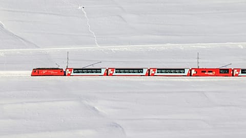 The Glacier Express on its way through Goms, Switzerland. 